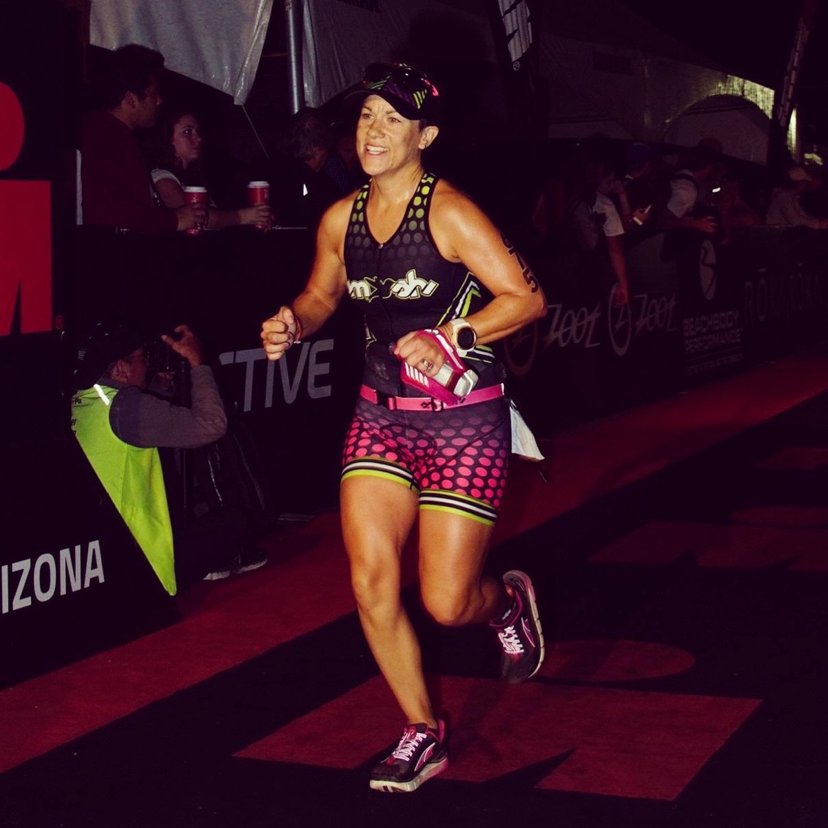 Photo of myself finishing an Ironman event in Arizona.